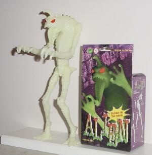 glow in the dark chupacabra alien toy.